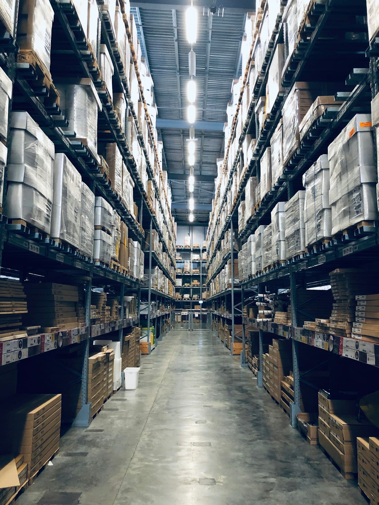 Boxed IT hardware and equipment in a stockroom